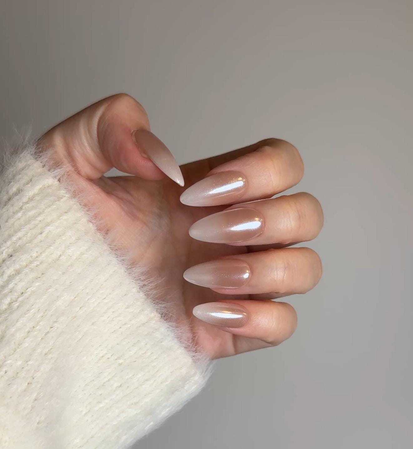 Nude chrome almond manicure